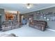 Open-concept living room with two sofas, neutral walls, and seamless transition to the kitchen for modern living at 1035 White Oak Dr, Plainfield, IN 46168