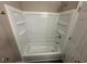 Bathroom featuring a shower and tub at 115 Hugo St, Indianapolis, IN 46229