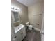Bathroom featuring a bright vanity and toilet at 115 Hugo St, Indianapolis, IN 46229