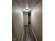 Hallway with wood flooring leading into other parts of the home at 115 Hugo St, Indianapolis, IN 46229