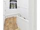 Stairwell featuring white trim, leading upstairs to a window with a view at 1201 Arrow Ave, Anderson, IN 46016