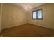 Bedroom with a decorative chandelier and two framed wall decorations at 1289 Woodcreek Dr, Greenwood, IN 46142
