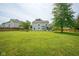 Large, fenced backyard with ample space for recreation and outdoor enjoyment at 13074 Lansdowne Dr, Fishers, IN 46038