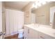 Bathroom features a shower with a white curtain and a vanity with modern fixtures at 13074 Lansdowne Dr, Fishers, IN 46038