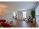 Open living area with natural light, comfortable seating, and access to other rooms at 13074 Lansdowne Dr, Fishers, IN 46038