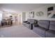 Inviting living room showcasing an open floor plan connecting the kitchen, dining, and seating areas at 13074 Lansdowne Dr, Fishers, IN 46038