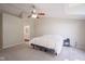 Spacious main bedroom featuring a ceiling fan and an en-suite bathroom at 13074 Lansdowne Dr, Fishers, IN 46038