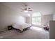 Large main bedroom with high ceilings and a large arched window allowing lots of light at 13074 Lansdowne Dr, Fishers, IN 46038