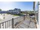 Relax on this balcony with outdoor seating and a view of the neighborhood townhouses at 13301 Minden Dr, Fishers, IN 46037