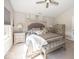 Well-lit bedroom featuring a large window and comfortable furnishings at 13301 Minden Dr, Fishers, IN 46037