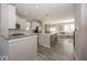 Open-concept kitchen features stainless steel appliances, granite countertops, and a breakfast bar at 13301 Minden Dr, Fishers, IN 46037