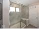 Modern tiled shower with a glass door and built-in bench at 13301 Minden Dr, Fishers, IN 46037