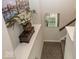 Nicely decorated stairwell niche featuring a glass block window at 13301 Minden Dr, Fishers, IN 46037