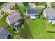 An aerial view of the home and its manicured lawn with well-maintained landscaping and neighborhood surroundings at 14052 Rayners Ln, Fishers, IN 46037