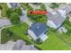 Aerial view of home with lush green yard and mature trees at 14052 Rayners Ln, Fishers, IN 46037