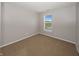 Bedroom with neutral paint and carpet, featuring a window with lake view at 14052 Rayners Ln, Fishers, IN 46037