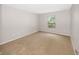 Bedroom with neutral paint, carpeted floors, and a bright window at 14052 Rayners Ln, Fishers, IN 46037