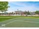 Outdoor community pool with people and landscaping surrounded by a fence at 14052 Rayners Ln, Fishers, IN 46037