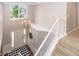 Open foyer with view to second level, chandelier and view of the front entrance at 14052 Rayners Ln, Fishers, IN 46037