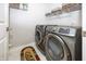 Convenient laundry room with modern washer and dryer units and ample storage at 14052 Rayners Ln, Fishers, IN 46037