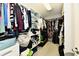 Walk-in closet includes ample shelving and storage space for clothing and accessories at 14082 Brazos Dr, Carmel, IN 46033