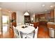 Spacious eat-in kitchen with stainless steel appliances and granite countertops at 14082 Brazos Dr, Carmel, IN 46033