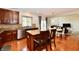 Open concept kitchen features center island, stainless steel appliances, and views to dining and living spaces at 14082 Brazos Dr, Carmel, IN 46033
