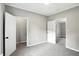 This bedroom is light and neutral with two doors at 1430 W 14Th St, Anderson, IN 46016