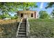 Charming home featuring a landscaped front yard and inviting front porch at 1430 W 14Th St, Anderson, IN 46016