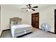 Cozy bedroom with a ceiling fan and natural light, with a view of the door at 1456 Bent Tree Pl, Greenwood, IN 46143