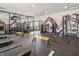 Bright fitness center with modern equipment including weight machines, treadmills, and ample workout space at 1563 Adios Butler Ct, Danville, IN 46122