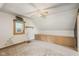 This bedroom has an AC window unit, a built-in cabinet, and neutral carpet at 16000 W 700 S, Anderson, IN 46017