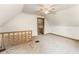 The bedroom has neutral walls, carpet, and access to another room through a doorway at 16000 W 700 S, Anderson, IN 46017