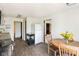 This kitchen features black appliances, white cabinets, and a wood dining set at 16000 W 700 S, Anderson, IN 46017