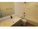 Modern bathroom with a sleek vanity, a sink, and a bathtub/shower combination at 17110 Cowbell Dr, Noblesville, IN 46060