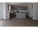 Open-concept kitchen featuring a center island, stainless steel appliances, and ample cabinet space at 17110 Cowbell Dr, Noblesville, IN 46060