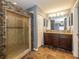Well-appointed bathroom features a tiled shower, double vanity, and ample counter space at 19522 Diamond Way, Noblesville, IN 46062