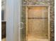Elegant shower with tiled walls and glass door, offering a spa-like experience at 19522 Diamond Way, Noblesville, IN 46062