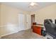 Cozy bedroom with neutral carpet, a ceiling fan, and bright natural light at 19522 Diamond Way, Noblesville, IN 46062