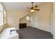 Bright bedroom featuring a round window, dresser, and ample space at 19522 Diamond Way, Noblesville, IN 46062