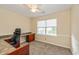Bright office space with a built-in desk and a large window for natural light at 19522 Diamond Way, Noblesville, IN 46062