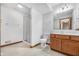 Bathroom with tile floor, vanity, shower, and lighting at 2402 Redspire Blvd, Goshen, IN 46526