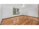 Bright bedroom features a ceiling fan and hardwood floors at 2402 Redspire Blvd, Goshen, IN 46526