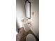 Small bathroom with pedestal sink, toilet, mirror, and medicine cabinet at 249 N Mill St, Plainfield, IN 46168