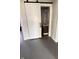 Bathroom features barn door entry, tiled walls, updated fixtures and vanity with ample storage at 249 N Mill St, Plainfield, IN 46168