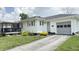 Charming home with a well-manicured front yard and inviting curb appeal at 249 N Mill St, Plainfield, IN 46168