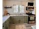 Bright kitchen featuring painted cabinets, stainless steel appliances, and ample counter space for culinary creativity at 249 N Mill St, Plainfield, IN 46168