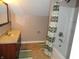 Bathroom featuring a shower, toilet, and sink at 2502 N Harding St, Indianapolis, IN 46208