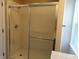 Walk in shower with sliding glass doors at 2502 N Harding St, Indianapolis, IN 46208