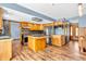 Well-lit kitchen featuring stainless appliances, wood cabinetry and an open floor plan at 2823 Tulip Dr, Indianapolis, IN 46227